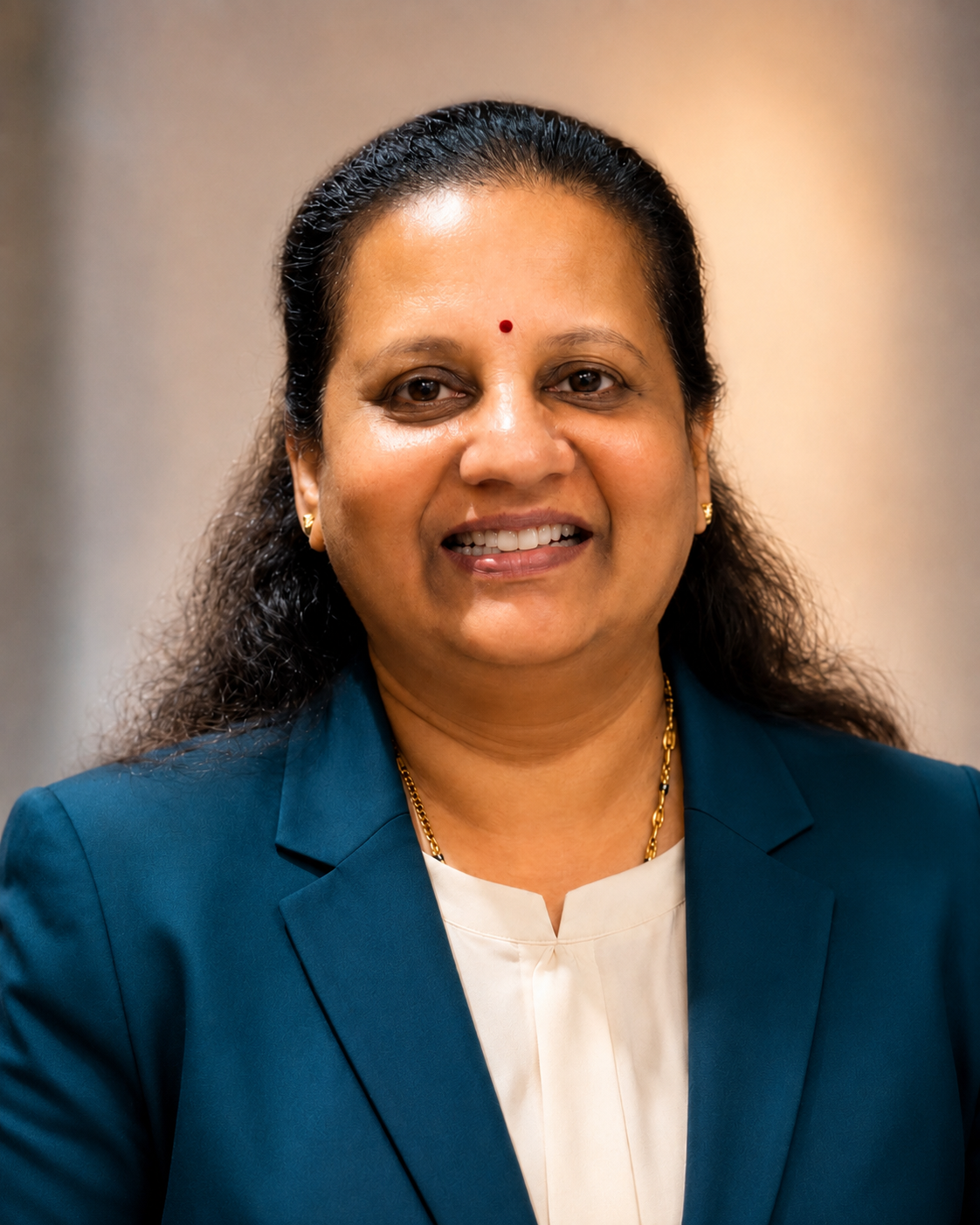 Professional portrait of Sripriya Kalyanam, co-founder for finance and governance at Nivas AI